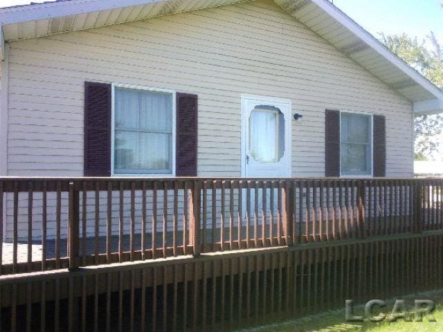 11800 N Adrian Hwy, Clinton, MI 49236 - view of front of property featuring a deck