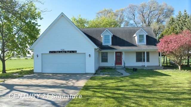 5530 Hess Rd, Saginaw, MI 48601 - view of front of home with driveway, a garage, a front yard, and covered porch