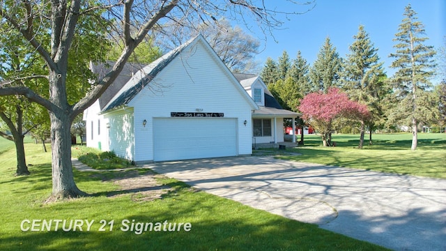 5530 Hess Rd, Saginaw, MI 48601 - view of side of property with an attached garage, concrete driveway, and a lawn
