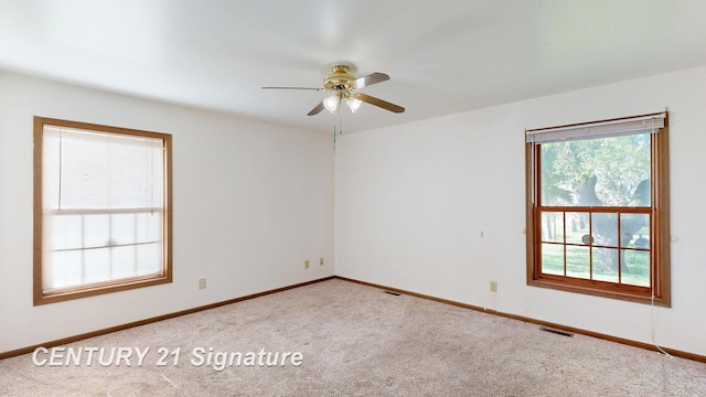 5530 Hess Rd, Saginaw, MI 48601 - empty room featuring ceiling fan, carpet, and baseboards