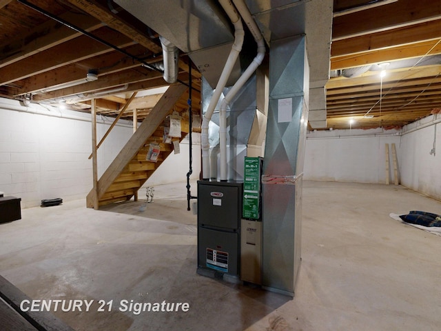 5530 Hess Rd, Saginaw, MI 48601 - unfinished below grade area with stairs and heating unit