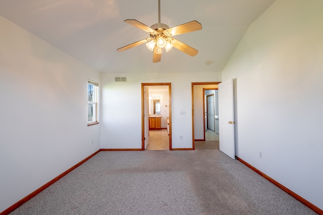 unfurnished bedroom featuring baseboards, carpet floors, and ceiling fan