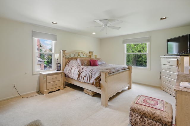 bedroom featuring light carpet, baseboards, ceiling fan, and recessed lighting