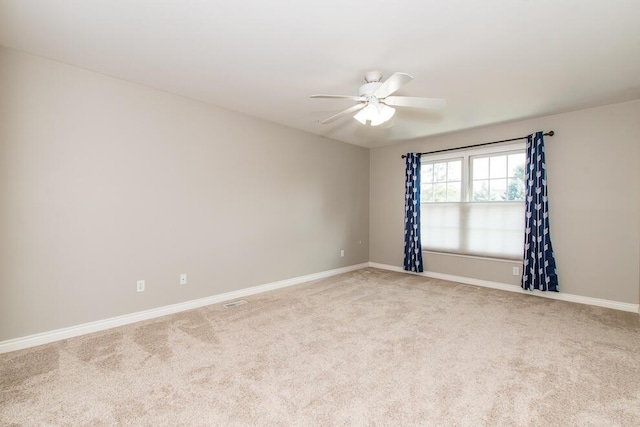 7294 Mackenzie Ln, Portage, MI 49024 - unfurnished room with a ceiling fan, carpet flooring, and baseboards