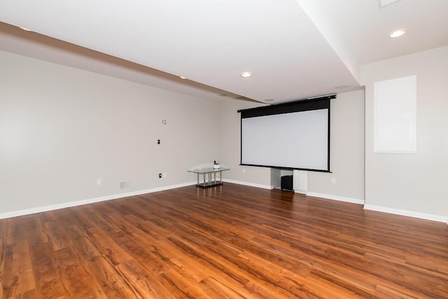 7294 Mackenzie Ln, Portage, MI 49024 - cinema room featuring wood finished floors, baseboards, and recessed lighting