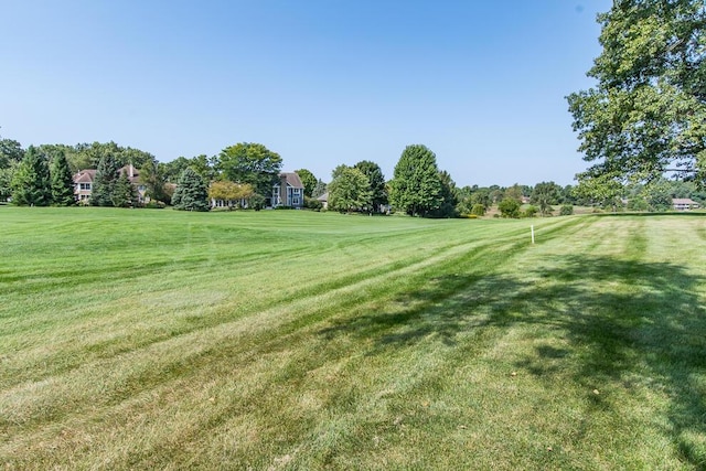 7294 Mackenzie Ln, Portage, MI 49024 - view of home's community featuring a lawn