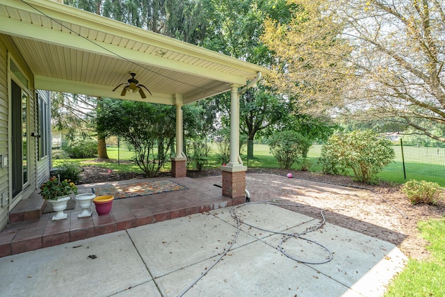 7294 Mackenzie Ln, Portage, MI 49024 - view of patio / terrace featuring a ceiling fan, fence, and covered porch