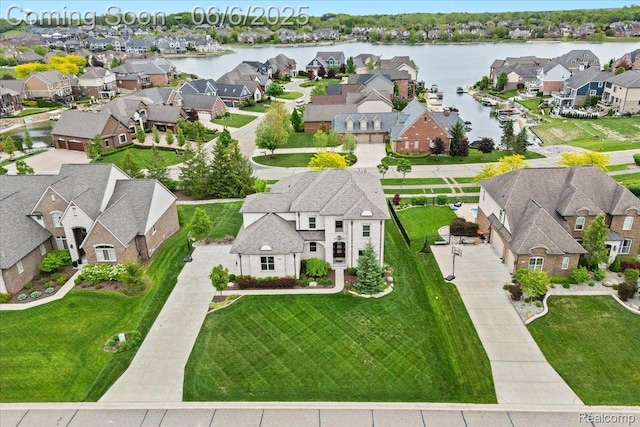 10611 Stoney Point Dr, South Lyon, MI 48178 - aerial perspective of suburban area with a large body of water