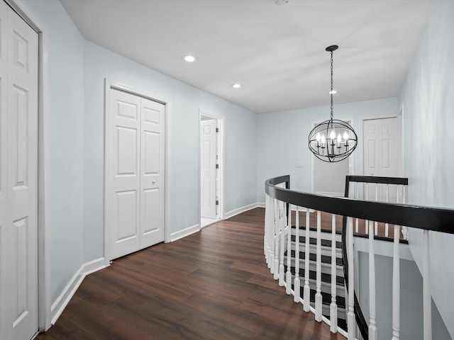 4206 Southmoor Ln, West Bloomfield, MI 48323 - hallway featuring dark wood-style flooring, baseboards, recessed lighting, and a chandelier