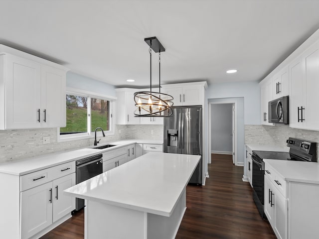 4206 Southmoor Ln, West Bloomfield, MI 48323 - kitchen featuring stainless steel appliances, a chandelier, backsplash, a sink, and recessed lighting