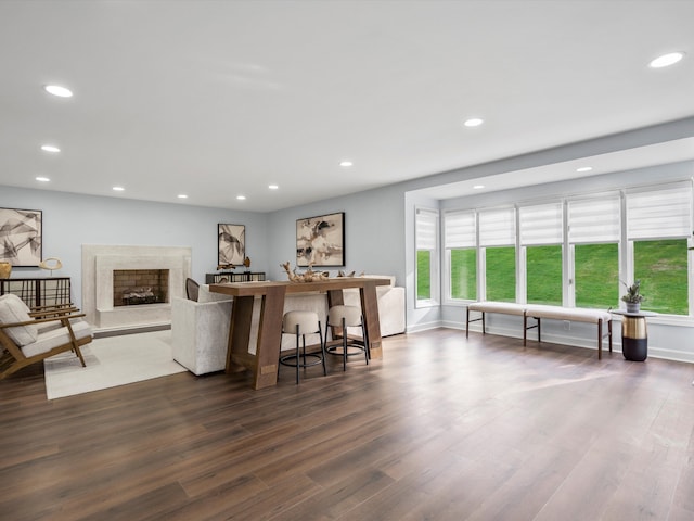 4206 Southmoor Ln, West Bloomfield, MI 48323 - bar with plenty of natural light, dark wood-type flooring, recessed lighting, a premium fireplace, and baseboards