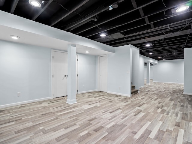 4206 Southmoor Ln, West Bloomfield, MI 48323 - finished basement with wood finished floors and baseboards