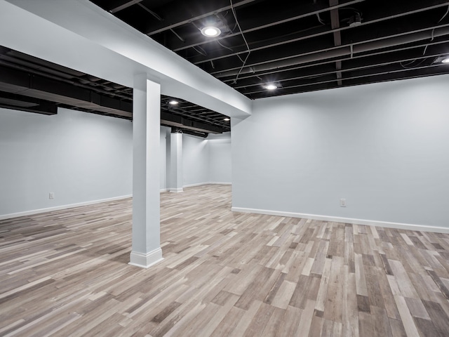 4206 Southmoor Ln, West Bloomfield, MI 48323 - finished basement featuring wood finished floors and baseboards