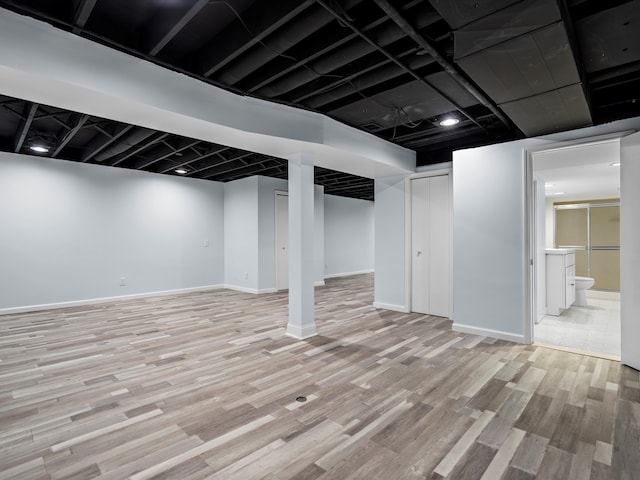 4206 Southmoor Ln, West Bloomfield, MI 48323 - finished below grade area featuring wood finished floors and baseboards