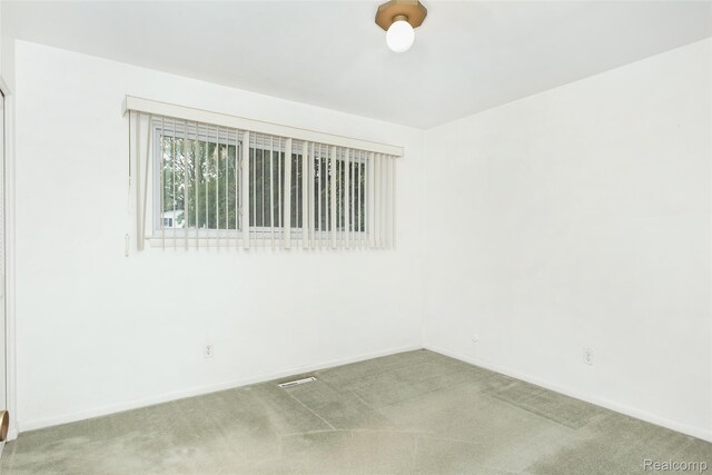 2982 Shawnee Ln, Waterford, MI 48329 - empty room with carpet floors and baseboards