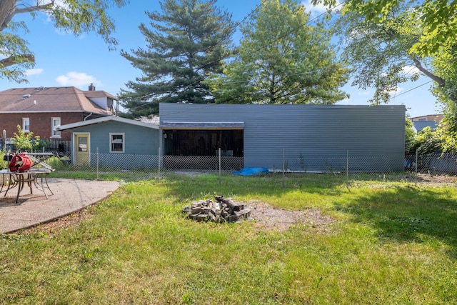 rear view of house with an outbuilding and an outdoor structure