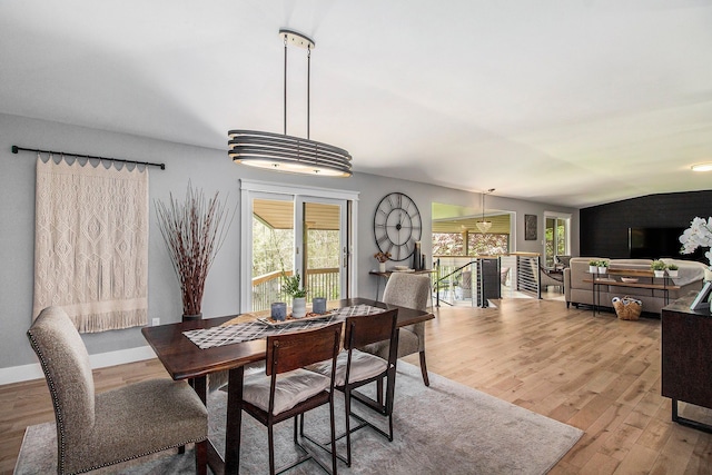 8440 Lance, Brighton, MI 48116 - dining space with wood finished floors, healthy amount of natural light, and baseboards