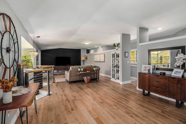 8440 Lance, Brighton, MI 48116 - living area with wood finished floors, baseboards, lofted ceiling, recessed lighting, and a fireplace
