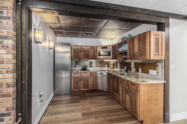 8440 Lance, Brighton, MI 48116 - kitchen featuring stainless steel appliances, a sink, dark wood finished floors, baseboards, and open shelves