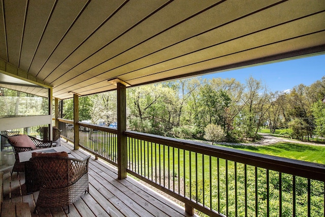 8440 Lance, Brighton, MI 48116 - wooden deck featuring a lawn and view of scattered trees