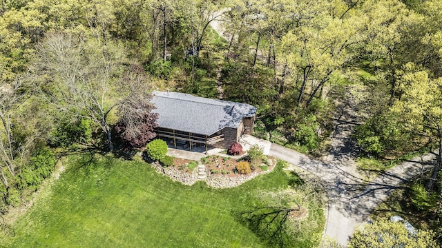 8440 Lance, Brighton, MI 48116 - aerial view of property and surrounding area featuring a forest