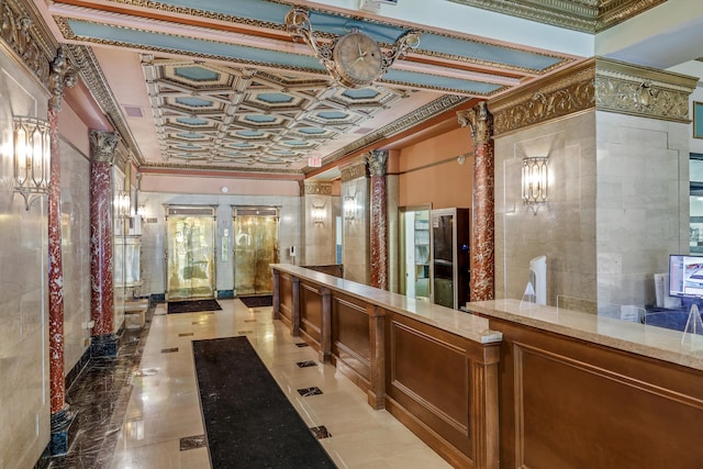 15 E Kirby St Unit 822, Detroit, MI 48202 - reception featuring tile walls, crown molding, french doors, and decorative columns