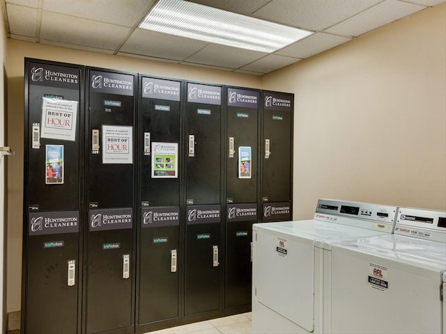 15 E Kirby St Unit 822, Detroit, MI 48202 - shared laundry room with washer and dryer, a package area, and tile patterned floors