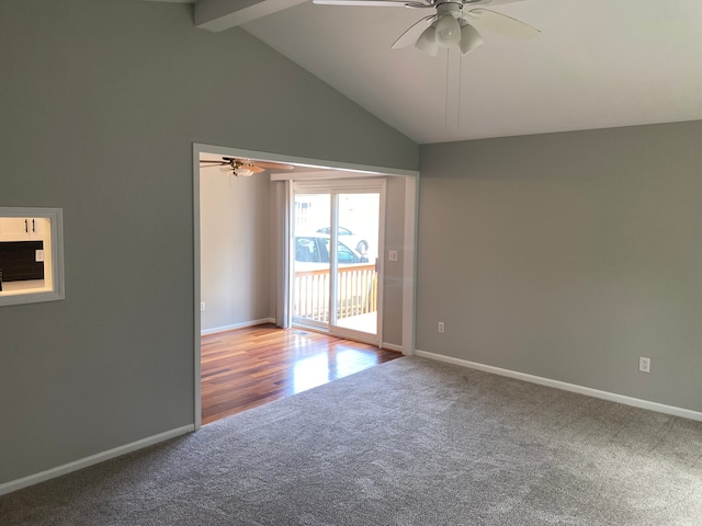 carpeted spare room with a ceiling fan, beam ceiling, baseboards, and high vaulted ceiling