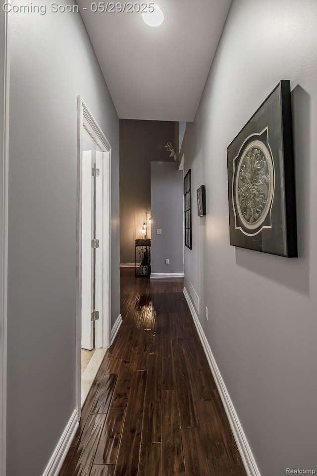 6940 Stonewood, Clarkston, MI 48346 - hallway featuring hardwood / wood-style floors and baseboards