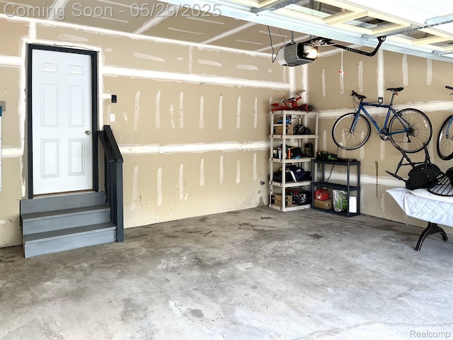 6940 Stonewood, Clarkston, MI 48346 - garage featuring a garage door opener