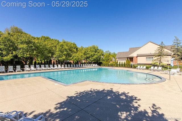 6940 Stonewood, Clarkston, MI 48346 - community pool featuring a patio area