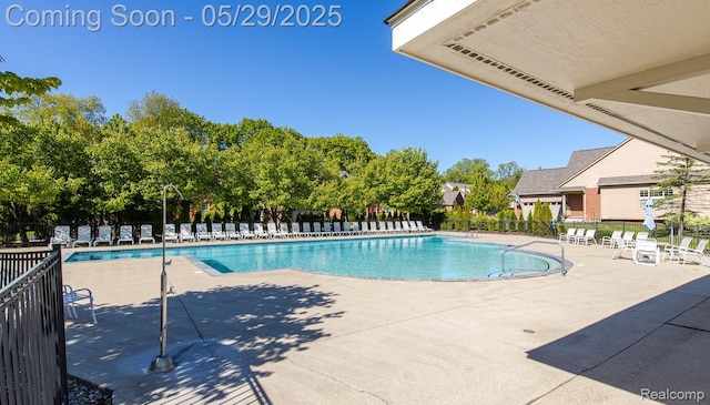 6940 Stonewood, Clarkston, MI 48346 - community pool featuring a patio