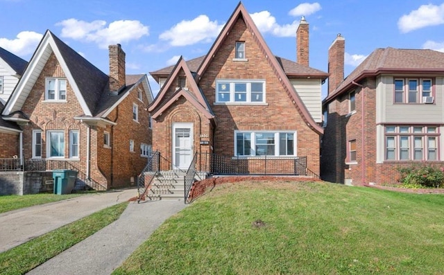 7305 Appoline St, Dearborn, MI 48126 - english style home with brick siding and a front yard
