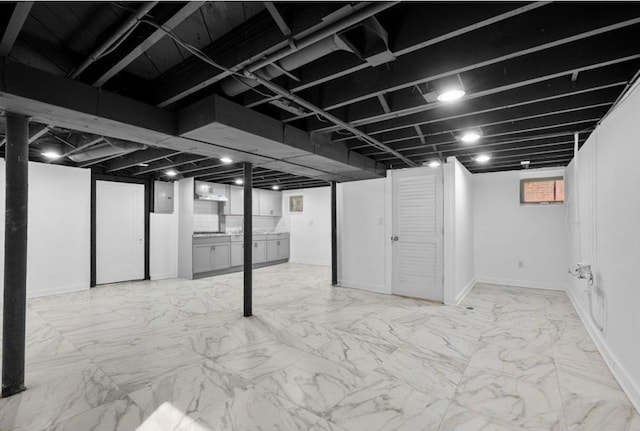 7305 Appoline St, Dearborn, MI 48126 - basement with electric panel, baseboards, and marble finish floors