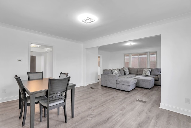 15053 Dumay St, Southgate, MI 48195 - dining space with light wood finished floors and baseboards