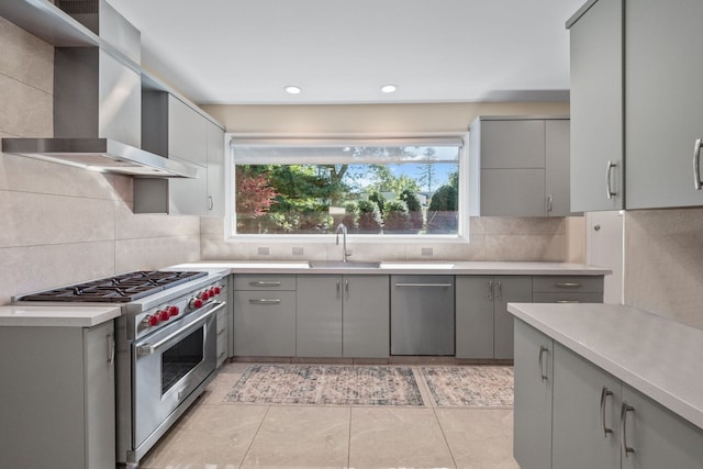 5280 Brookdale Rd, Bloomfield Hills, MI 48304 - kitchen featuring gray cabinets, stainless steel appliances, wall chimney exhaust hood, a sink, and recessed lighting