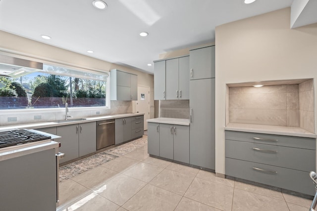 5280 Brookdale Rd, Bloomfield Hills, MI 48304 - kitchen featuring gray cabinetry, appliances with stainless steel finishes, a sink, backsplash, and recessed lighting