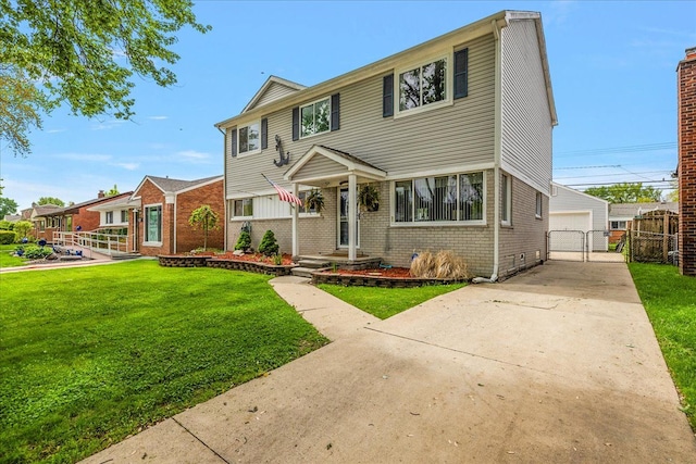 23142 Port St, Saint Clair Shores, MI 48082 - view of front of property with brick siding, an outbuilding, and a garage