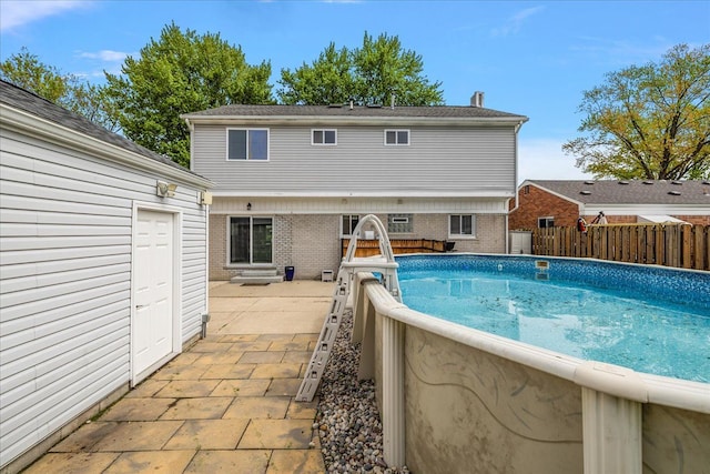 23142 Port St, Saint Clair Shores, MI 48082 - view of pool featuring fence and a patio