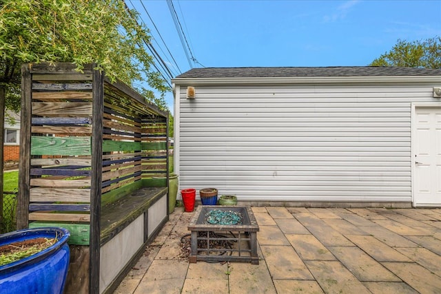 23142 Port St, Saint Clair Shores, MI 48082 - view of outdoor structure featuring an outdoor fire pit