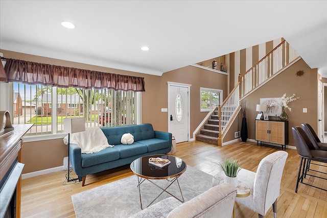 23142 Port St, Saint Clair Shores, MI 48082 - living area with baseboards, stairs, wood finished floors, and recessed lighting