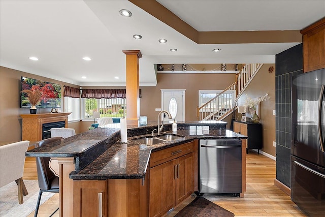 23142 Port St, Saint Clair Shores, MI 48082 - kitchen featuring a sink, dishwasher, black refrigerator, light wood finished floors, and recessed lighting