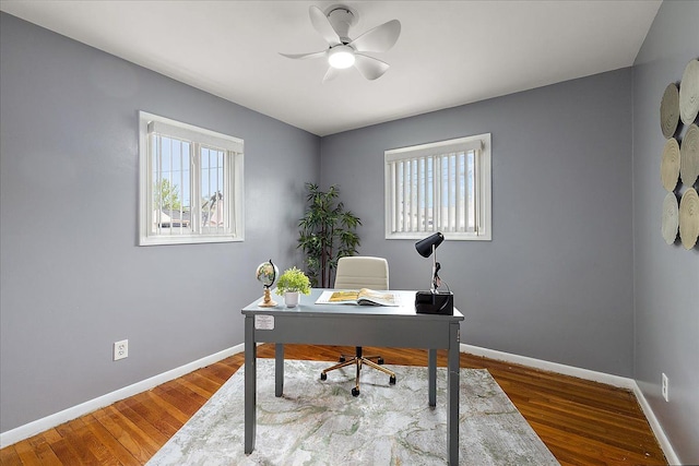 23142 Port St, Saint Clair Shores, MI 48082 - office space with baseboards, wood finished floors, and a ceiling fan