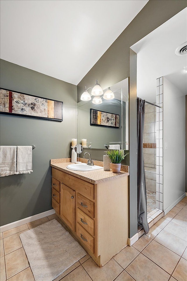 23142 Port St, Saint Clair Shores, MI 48082 - bathroom with tile patterned flooring, vanity, a tile shower, and baseboards