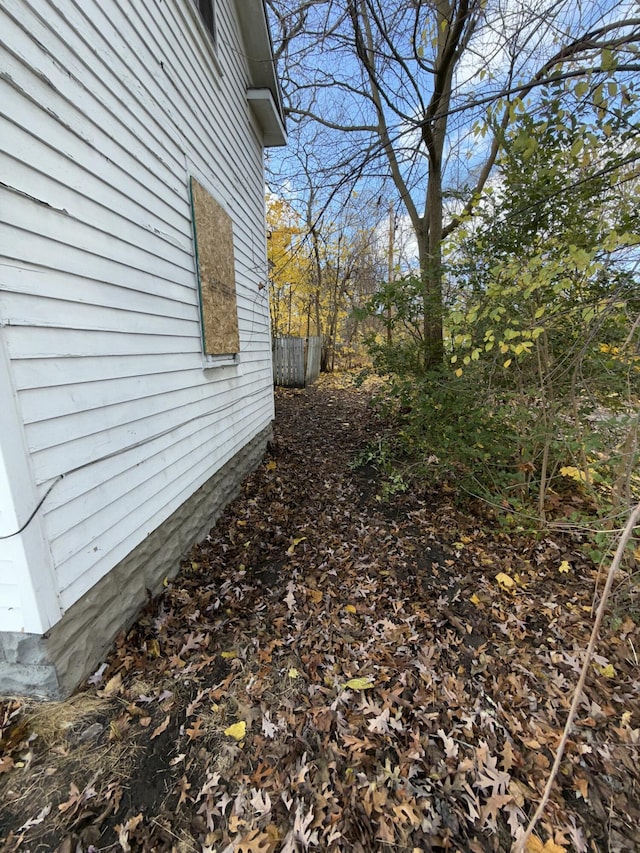 view of side of property with fence