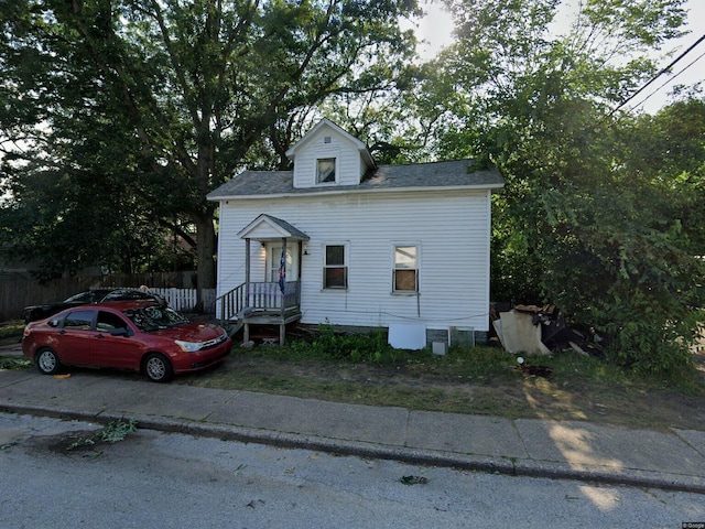 view of front of property with fence