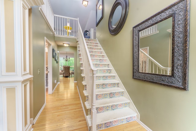 1418 Trailside Blvd, Wixom, MI 48393 - stairway featuring wood finished floors and baseboards