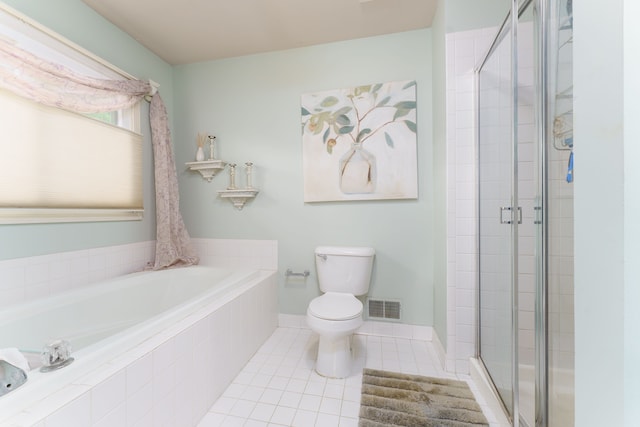 1418 Trailside Blvd, Wixom, MI 48393 - bathroom featuring a stall shower, toilet, tile patterned flooring, and a bath