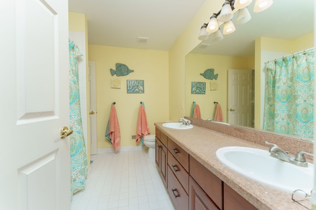 1418 Trailside Blvd, Wixom, MI 48393 - bathroom featuring tile patterned floors, double vanity, toilet, and baseboards
