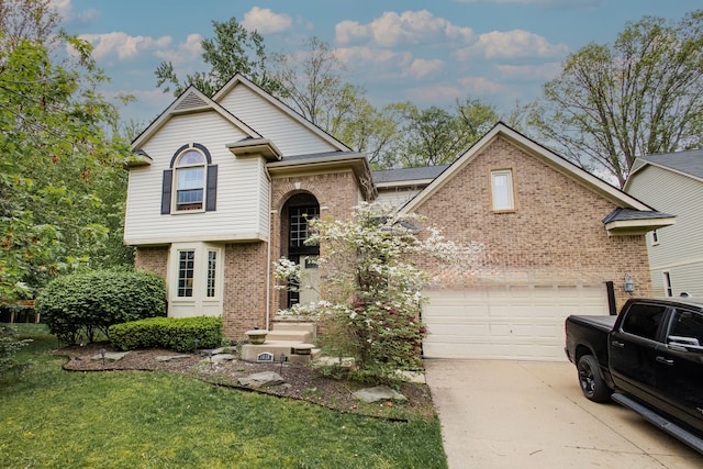 1418 Trailside Blvd, Wixom, MI 48393 - view of front of home with brick siding, concrete driveway, and a front yard